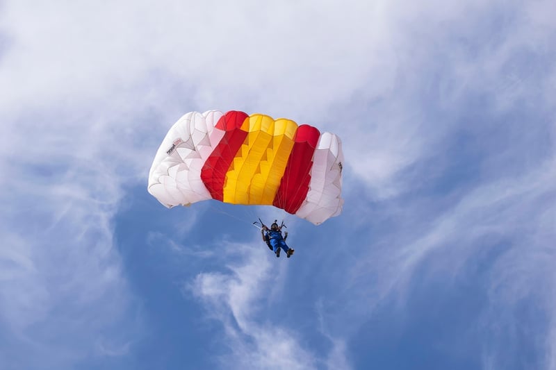 Skydiving Over Coastal Landscapes